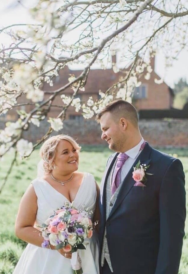 Spring wedding flowers, bride and groom matching bouquet & buttonhole