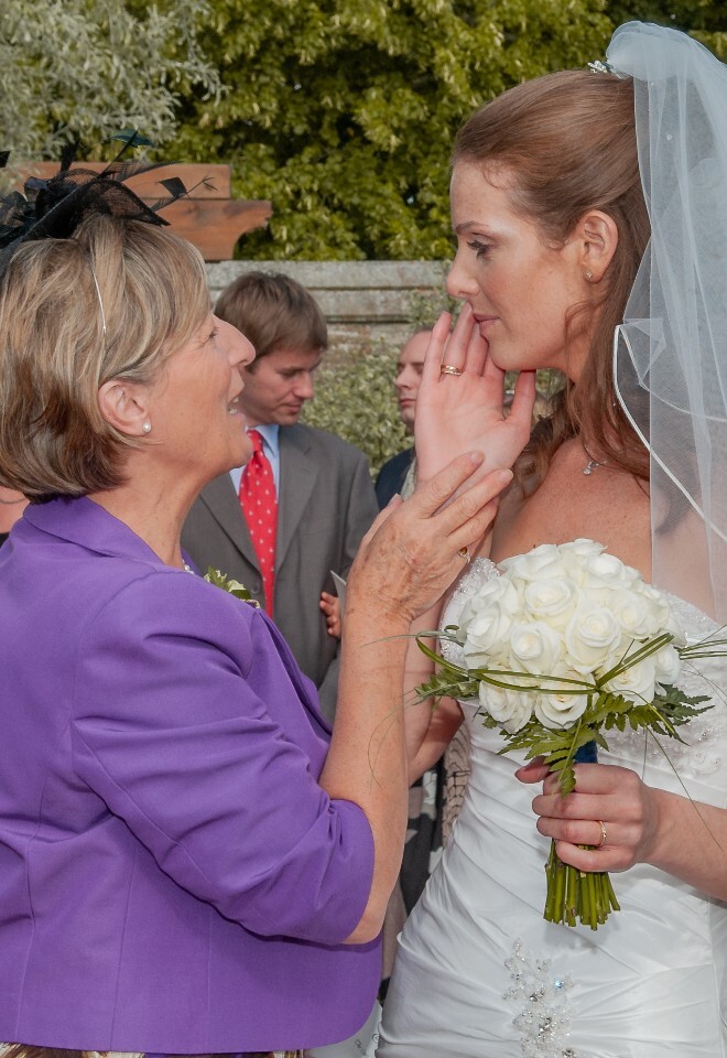 Canid moment with guest and bride following the wedding ceremony
