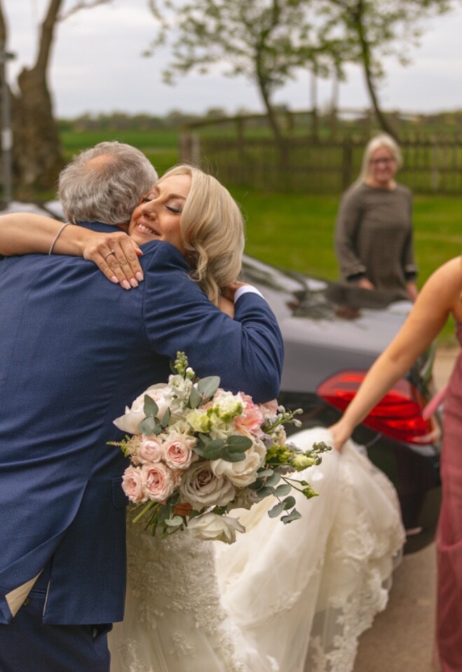 Natural wedding arrival moment captured during relaxed wedding photography