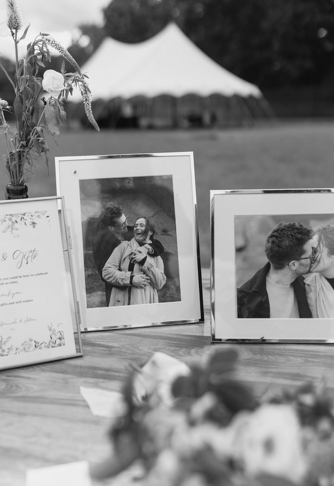 Couple photos with marquee in the distance