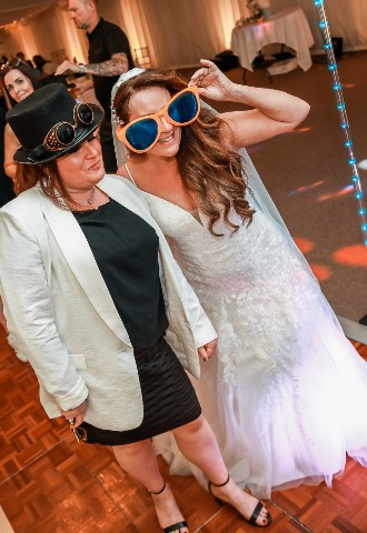 The Stables Wedding Farm, Oldham marquee wedding venue bride & guest photobooth pictures