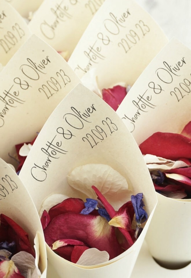 The Dried Petal Companys Boho Chic confetti cones in tray and filled with petals