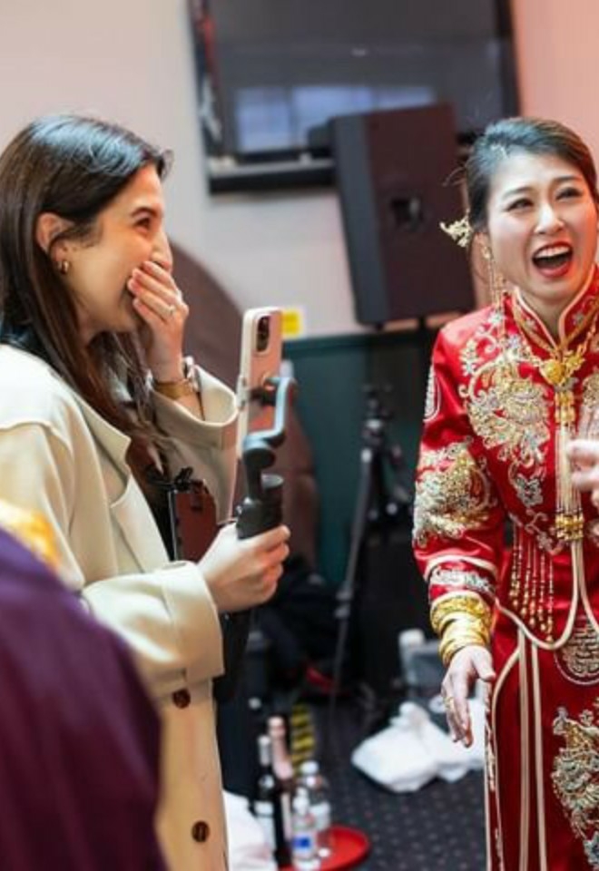 Wedding content creator congratulating bride and groom - Jan wong Photography