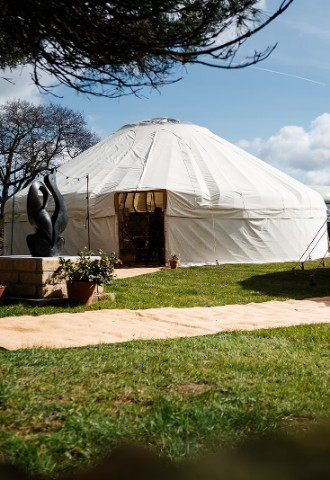 33ft yurt and petal pole marquee at Eavestone Lake
