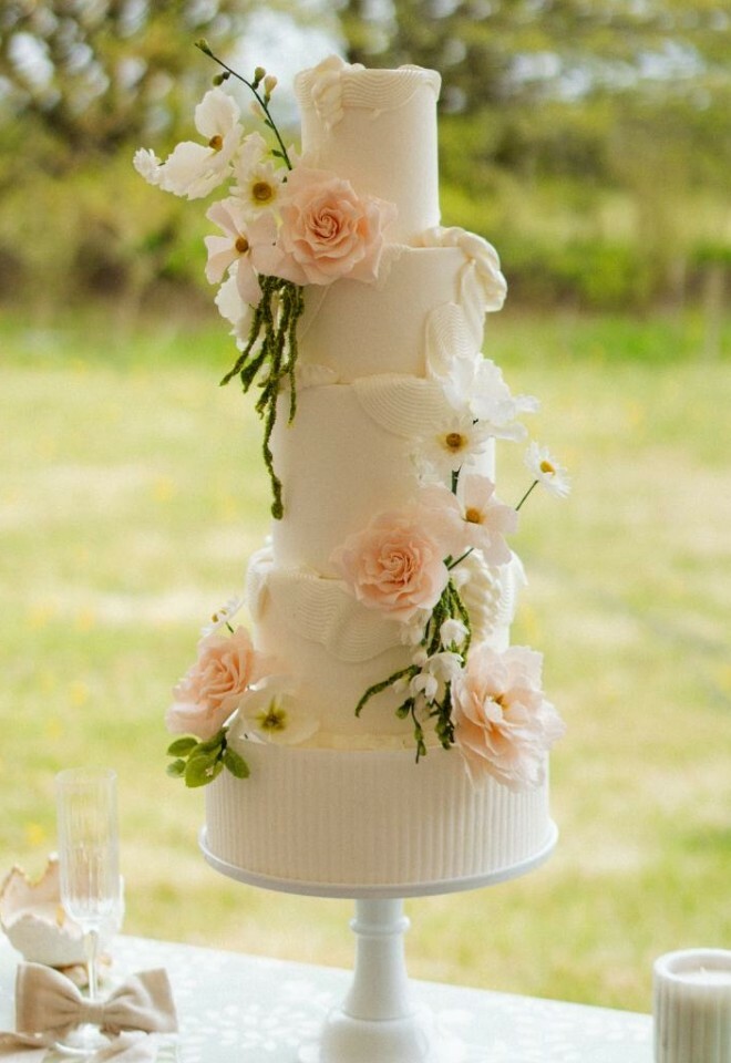 Modern white cake with sugar flowers
