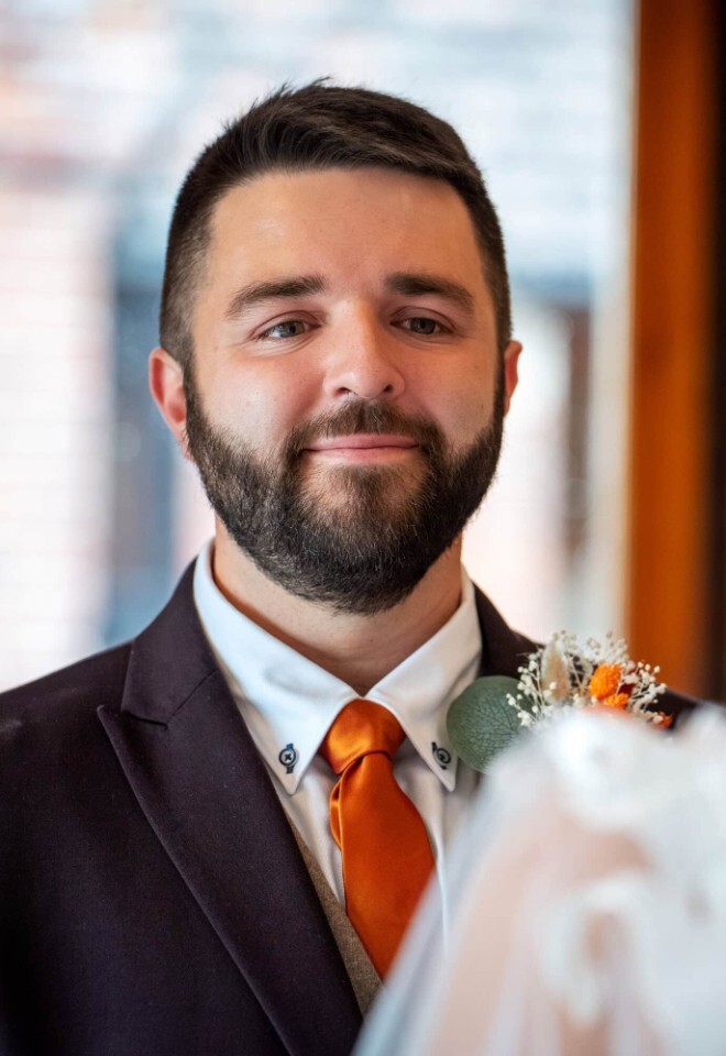 Groom looking at the bride