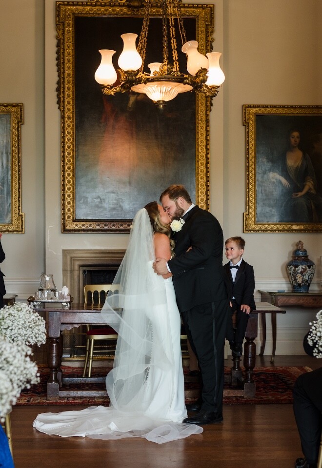 Bride and Groom first kiss at squerryes court