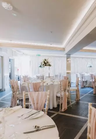 Beautifully dressed wedding reception room Whitley Hall Hotel Yorkshire