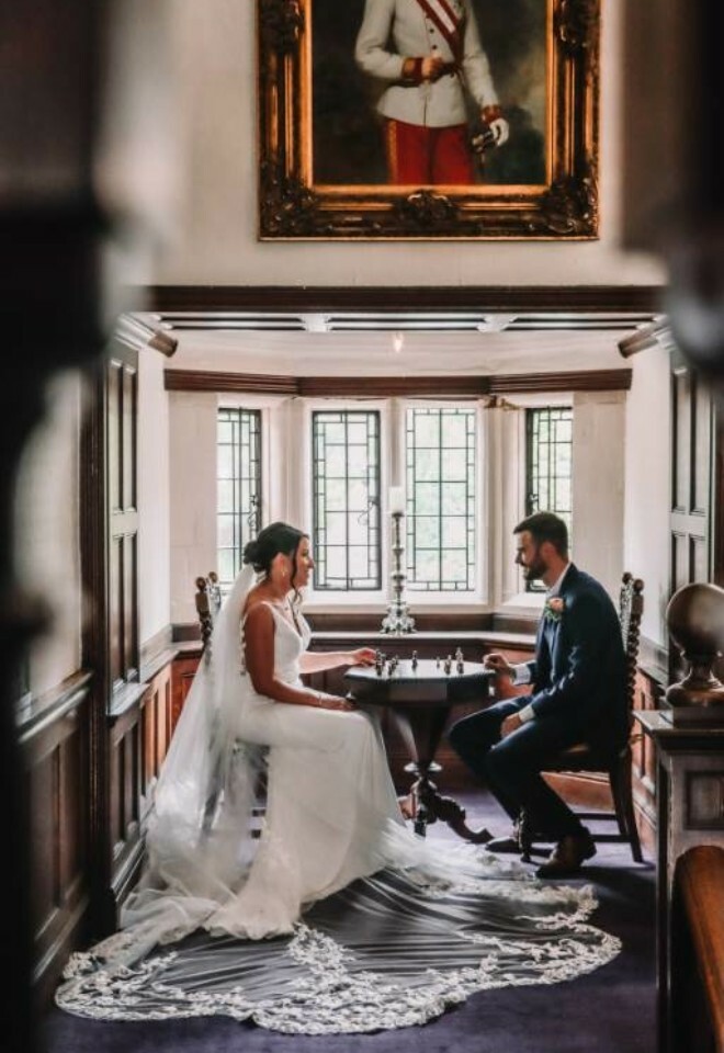 Couple playing chess in the venue