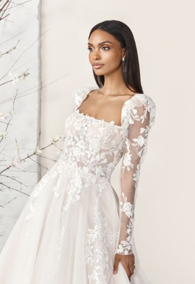 Bride wearing a sincerity designer wedding dress available from Broomvale Bridal Barns