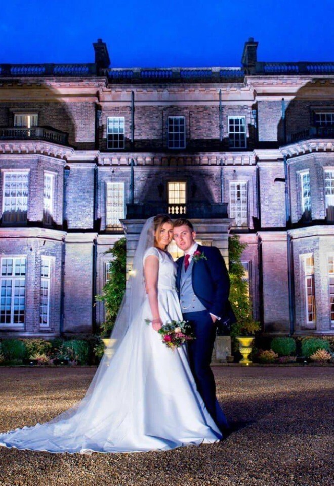 Hedsor House at dusk with the newlyweds
