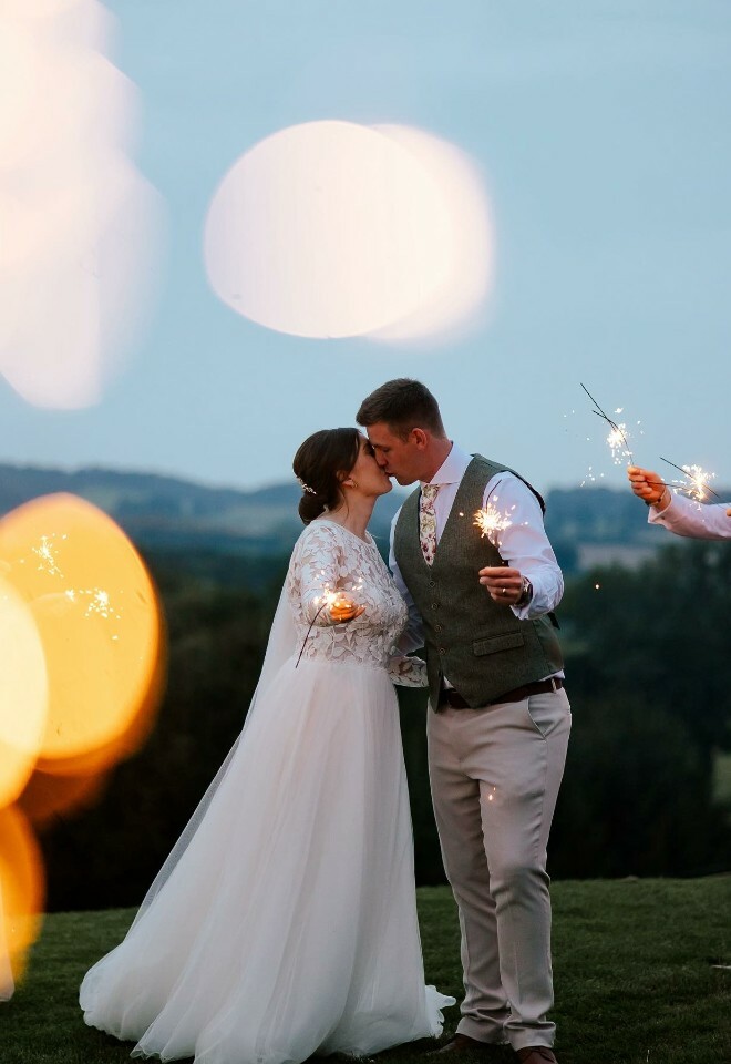 Bride & groom with sparklers at Skylark weddings daventry
