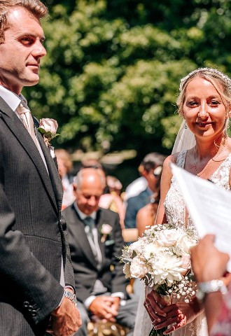 Celebrant Lisa with bride and groom at Boconnion