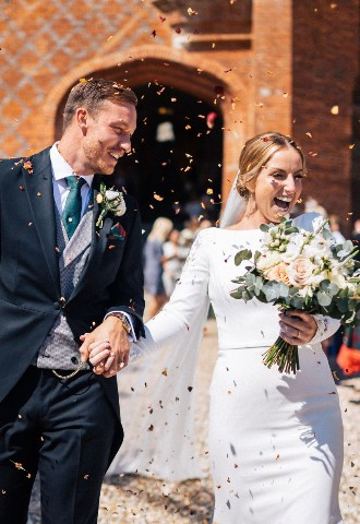 Newlywed couple at Farnham Castle