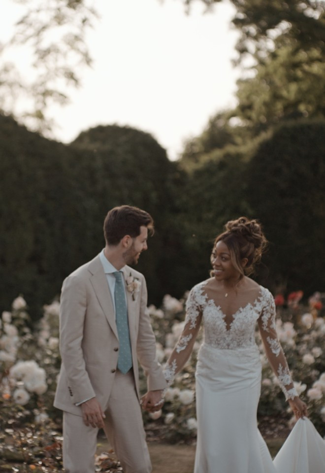 Bride and groom in the gardens of The Grove, Hertfordshire, captured by Dean Sherwood Wedding Films, Hertfordshire wedding videographer.