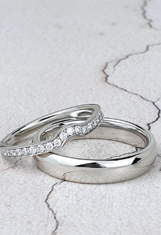 Custom-made platinum wedding rings for bride and groom