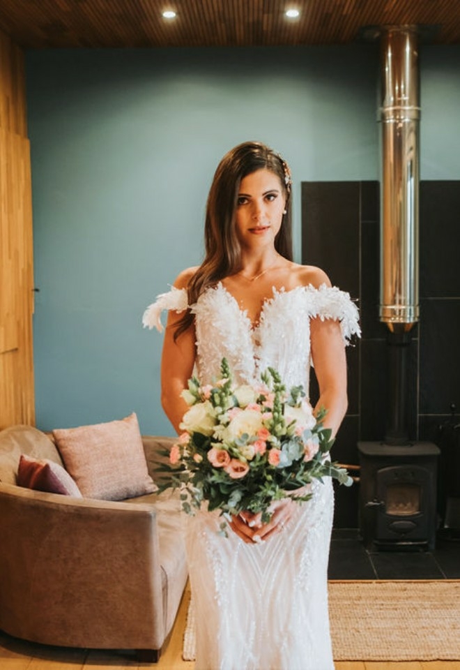 bride with bouquet at the Chilterns View Wedding Venue