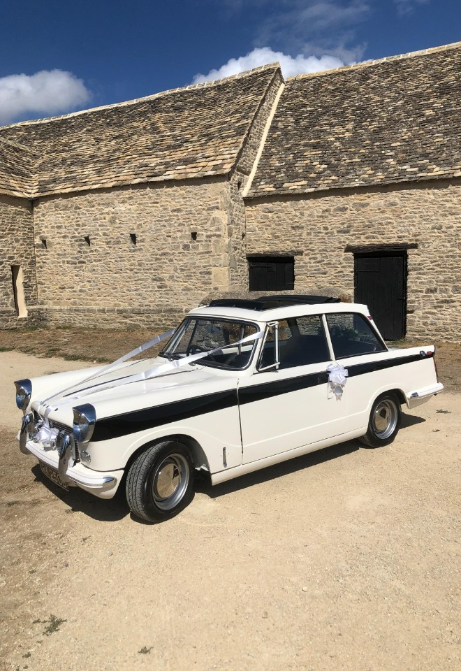 Ford Anglia wedding car in farmyard