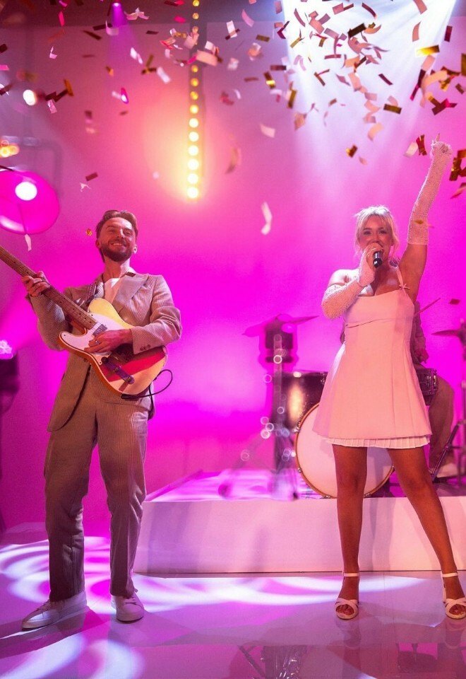 The Collective wedding band performing at a reception