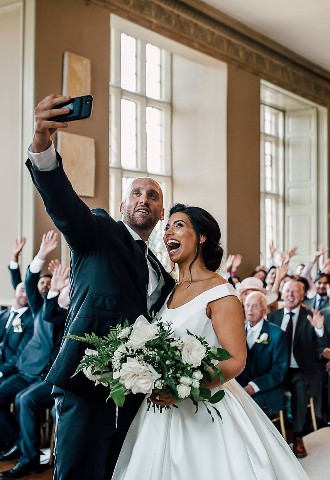 Bride and groom take their first selfie as a married couple, Howsham Hall