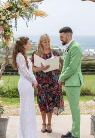 Celebrant Lisa with bride and groom at an eco wedding