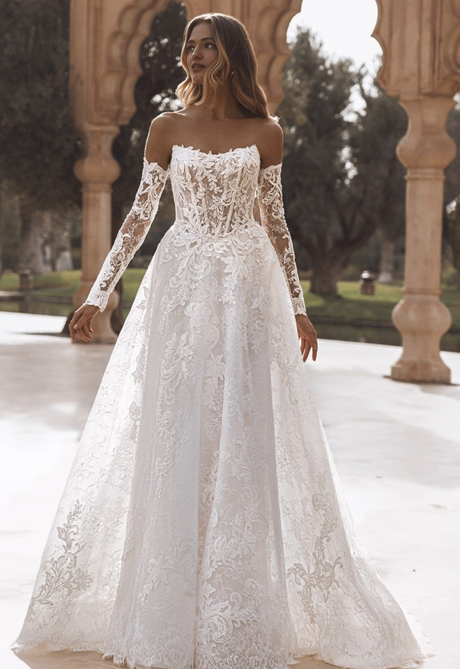 Vanessa by Enzoani is a beautiful corded French lace with detachable sleeves, available at Little London Brides