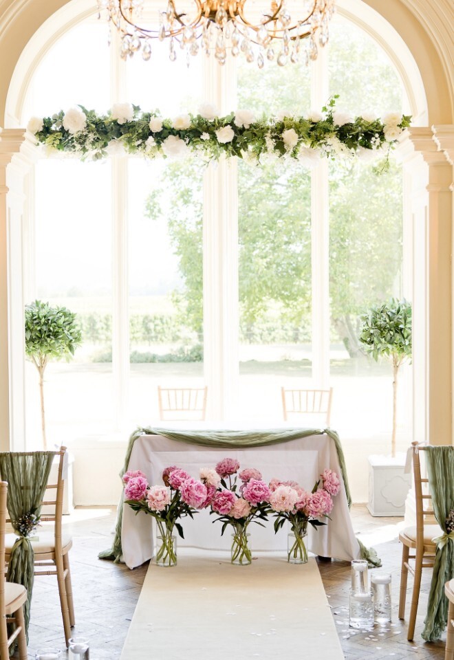 Pink and Green wedding ceremony room at Glewstone Court