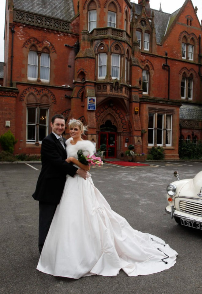 Bride and groom standing outside Bestwood Lodge