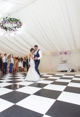 Black & white dance floor marquee wedding from Crystal Marquees Surrey