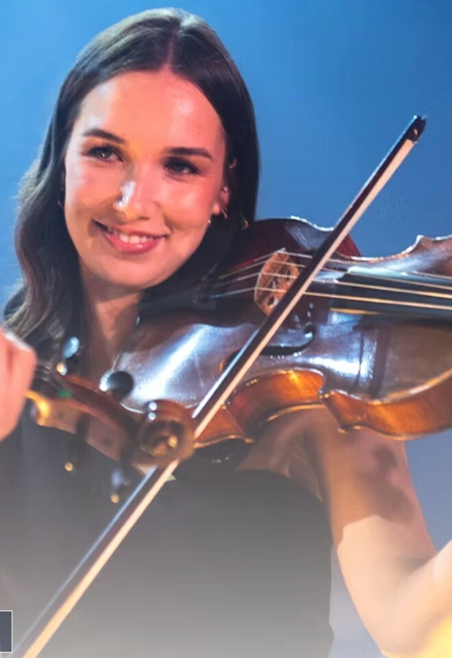 Violinist with the Collective band