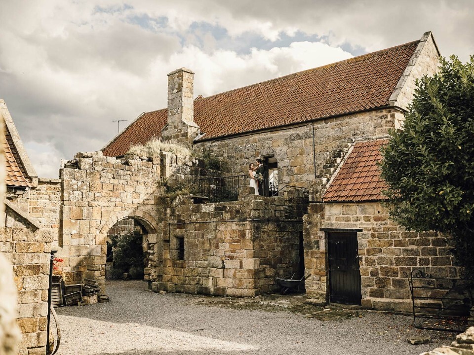 Exterior of rustic castle barn venue