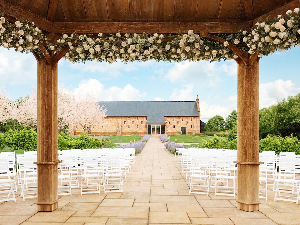 Ceremony area in outside of barn venue