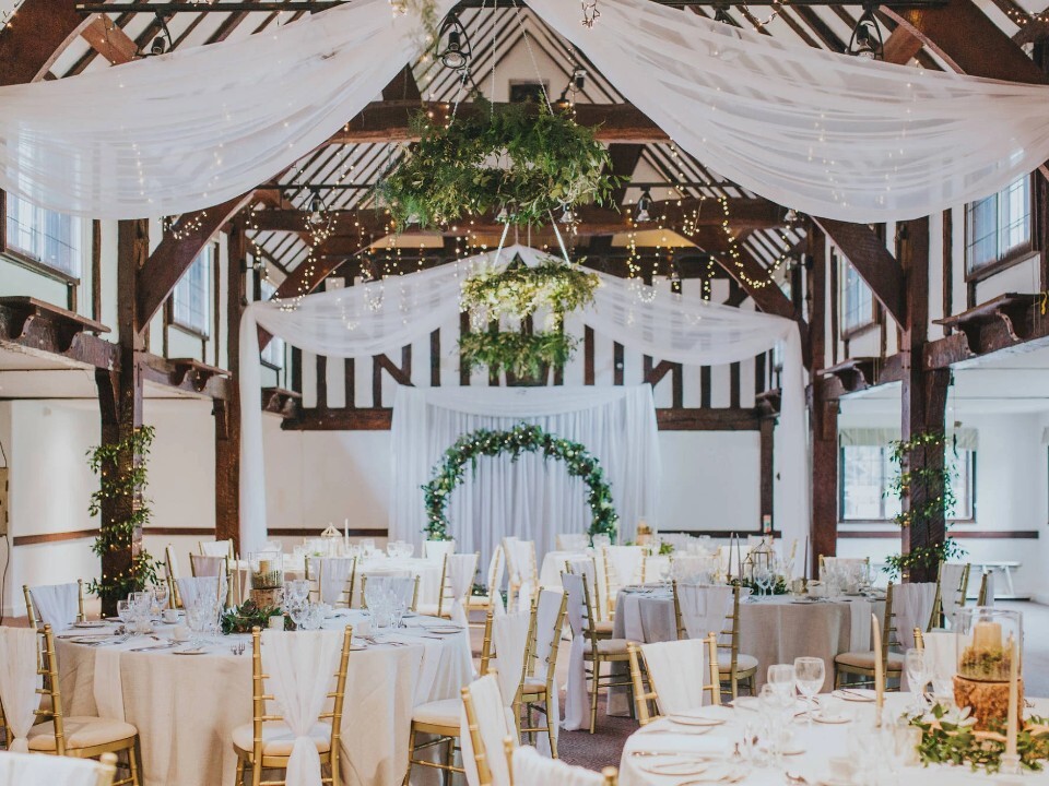 Seating area on the inside of barn venue 