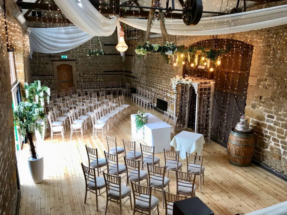 Ceremony area in inside of barn venue