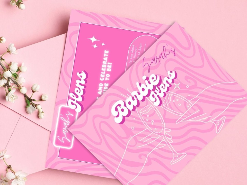 Pink Barbie-themed hen party invitation cards with white Barbie-style lettering and cocktail illustrations on a pastel pink background.