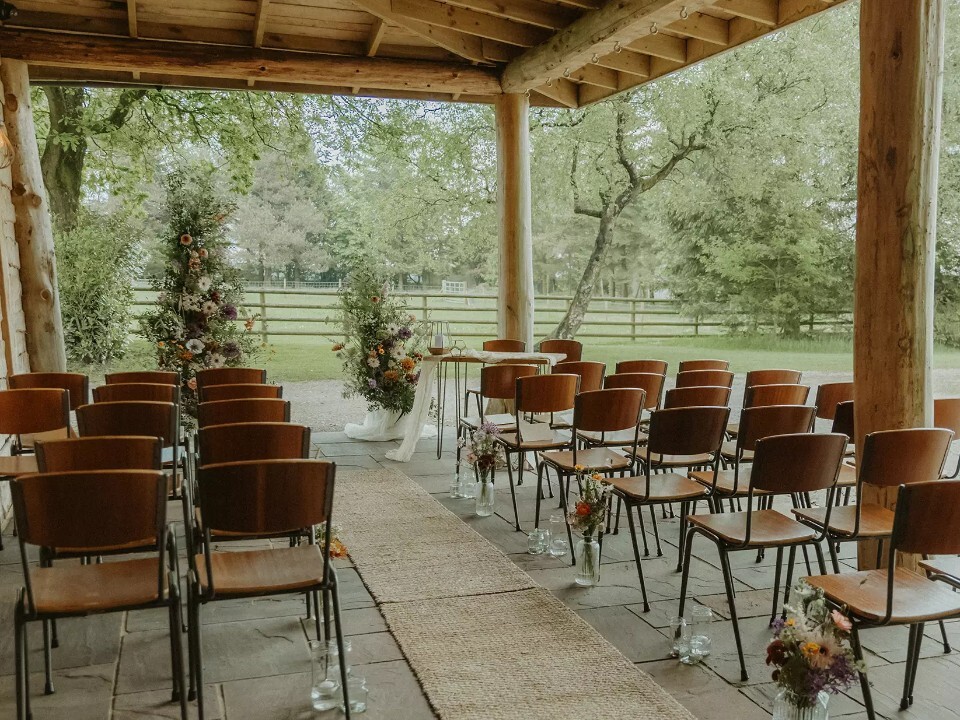Ceremony area in outside of barn venue