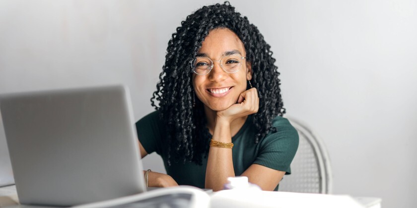 Wedding business owner working on their computer