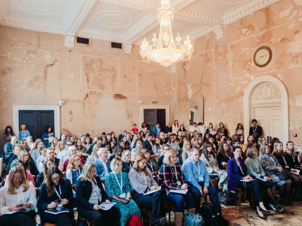 attendees sat in the main room at Old Sessions House London for the Guides for Brides UK Wedding Conference