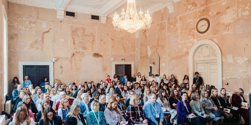 attendees sat in the main room at Old Sessions House London for the Guides for Brides UK Wedding Conference