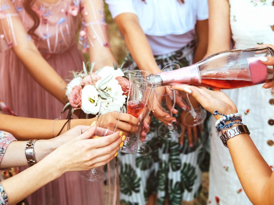 A bridal party with rose wine 