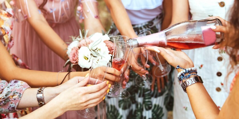 A bridal party with rose wine 