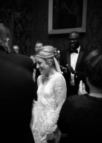 Bride arrival into the wedding breakfast - natural wedding photograph by Veiled Productions