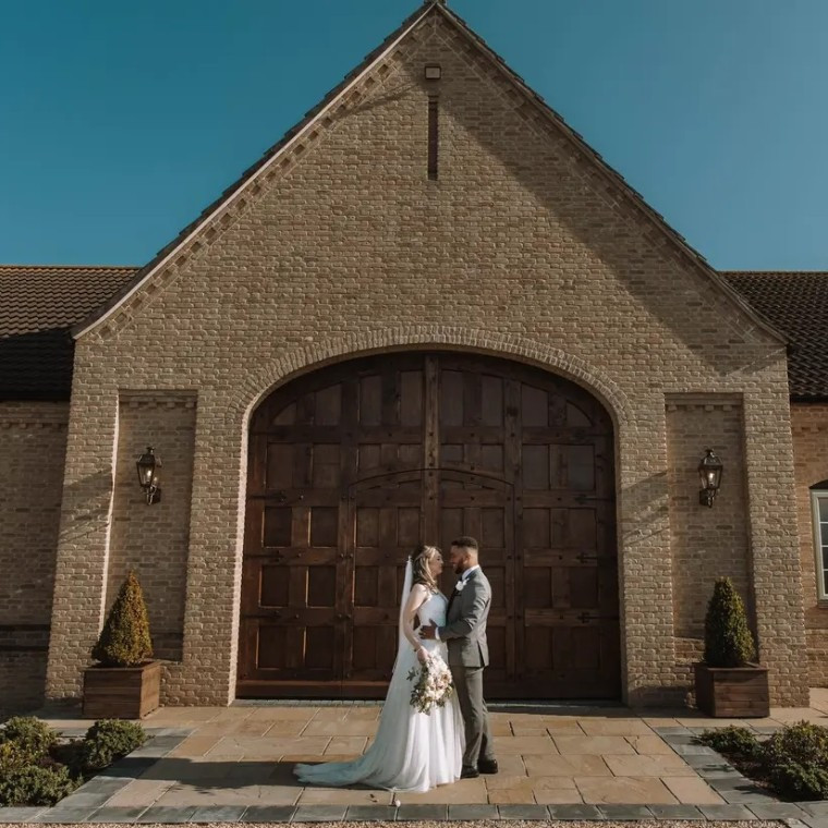 Wedding Couple outside Old Chapel Farm in Cambridge - Just married!