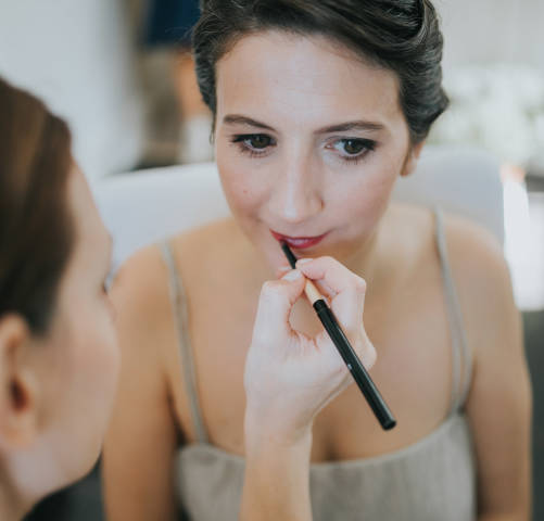 makeup artist lip touch up
