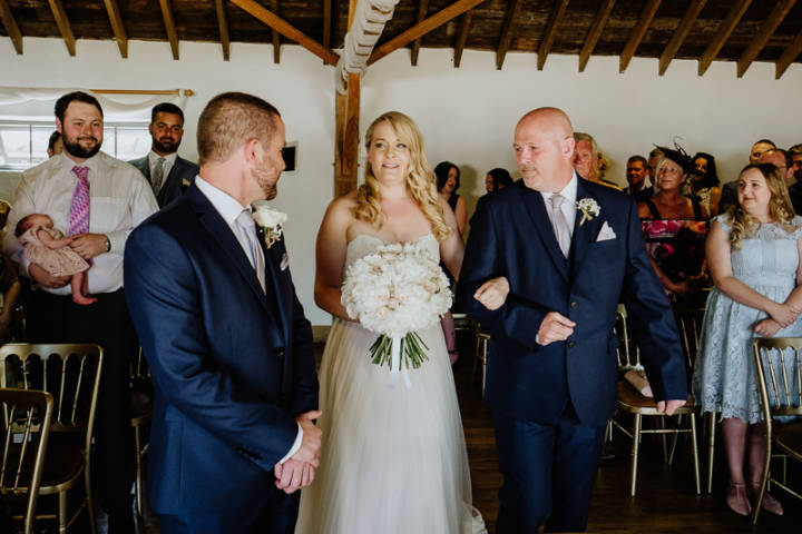A wedding ceremony at Tudor Barn