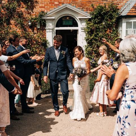 Confetti throw, couple just married at Wethele Manor