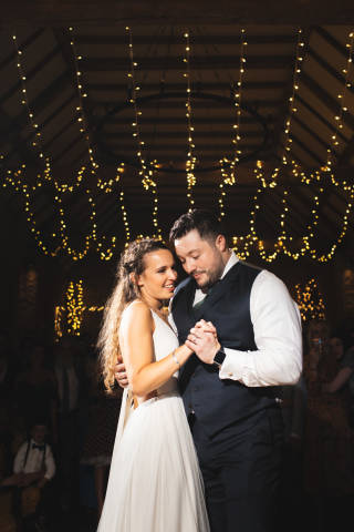 The Great Barn, barn wedding venue Oxfordshire - fairy lights, first dance