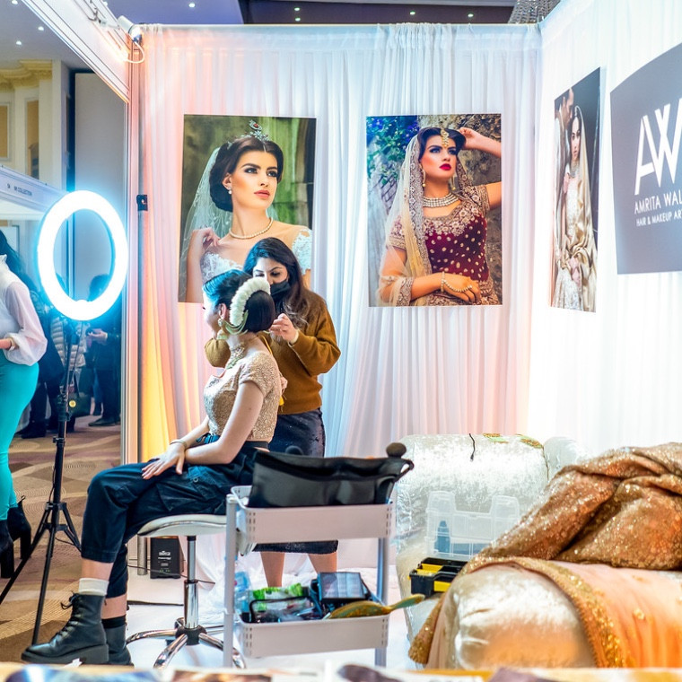 A prominent MakeUp artist creating her magic on a model at one of our events 