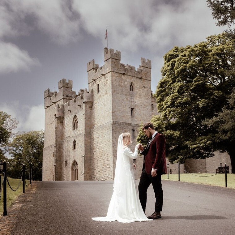 Bride & Groom In front of Langley Castle