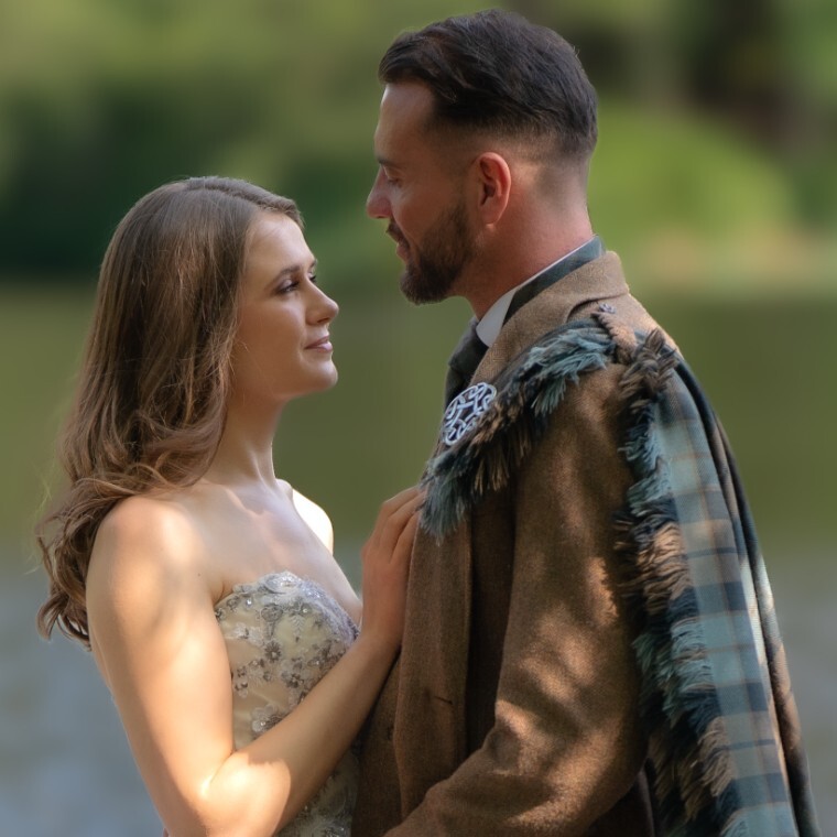 bride and groom looking at each other in glencoe scotland